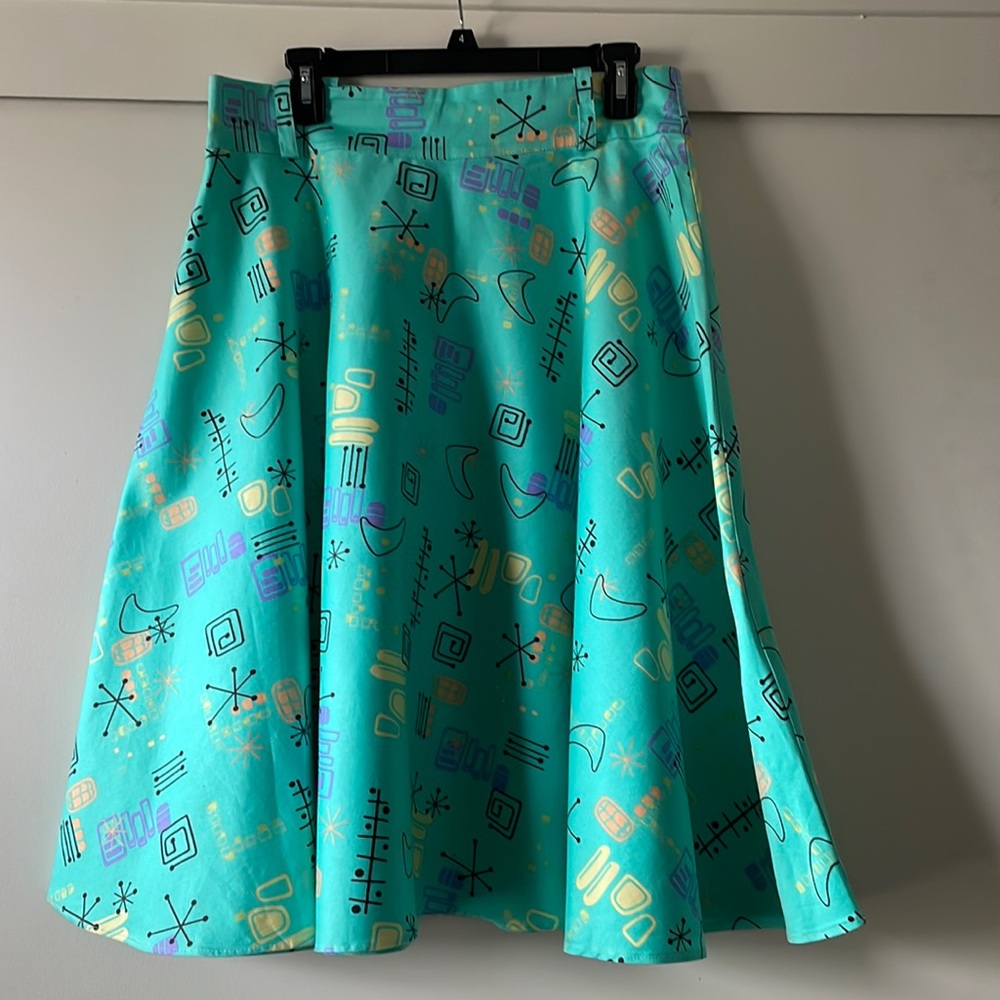 Pinup Couture Turquoise A-Line Skirt with Gold & Purple Atomic Print